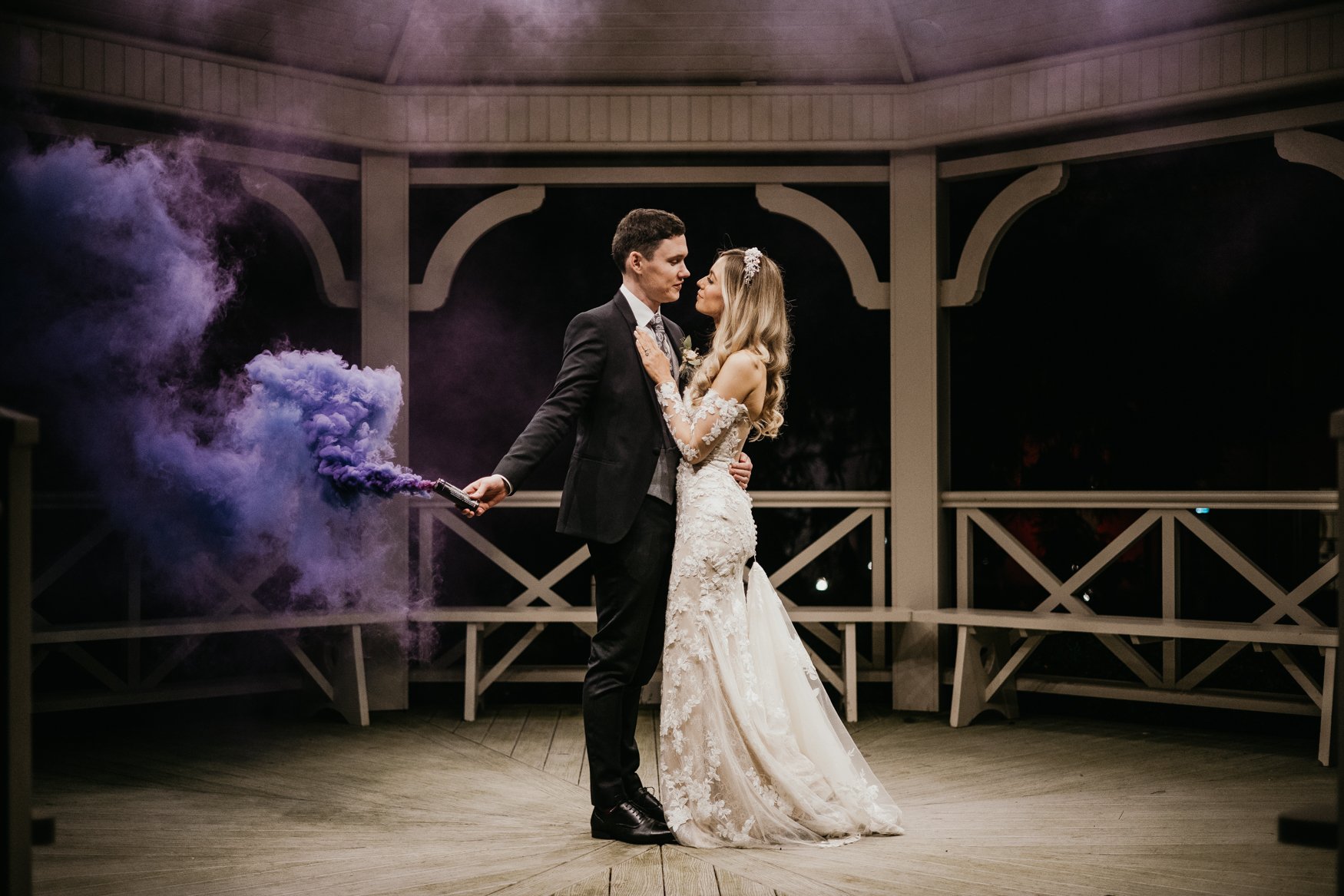 Bride and groom sharing a private dance under a garden gazebo at night – captured by Darren Byrne, Wedding Photographer Ireland.